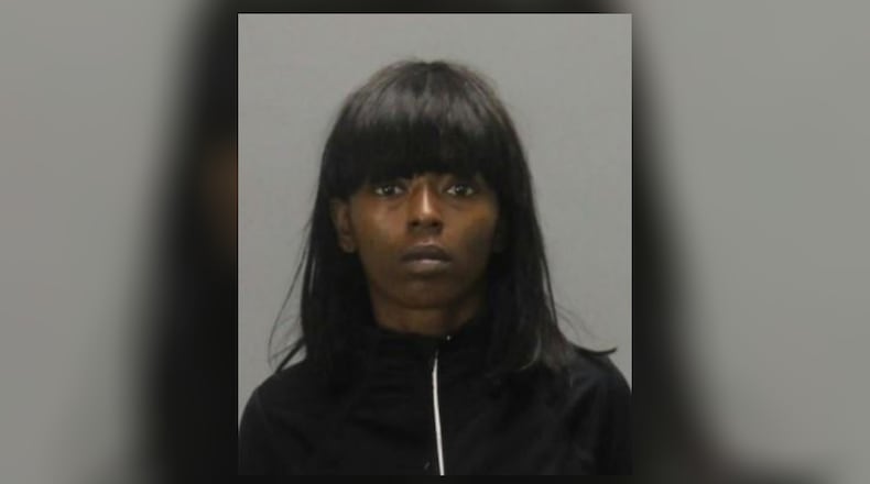 Jalessia Brown is facing a charge of murder in the shooting and stabbing death of her 32-year-old boyfriend.