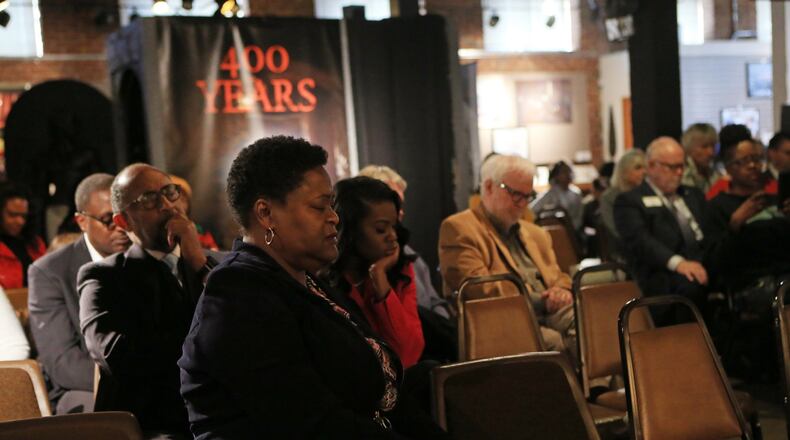 Felicia Moore, president of the Atlanta City Council, prays during a vigil for U.S. Rep. John Lewis on Sunday, January 12, 2020, at the APEX Museum in Atlanta. Lewis has been diagnosed with stage 4 pancreatic cancer. (Photo: Christina Matacotta/Special to the AJC)