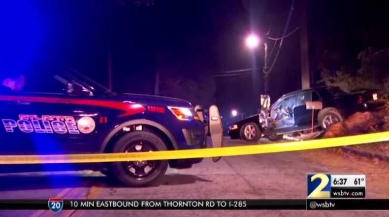 Police investigate a double shooting that ended in a car crash overnight Monday in northwest Atlanta. (Credit: Channel 2 Action News)