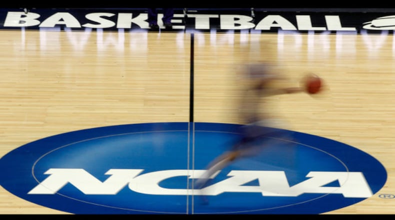 The NCAA long enforced rules against college athletes monetizing their fame before being forced to back down on name, image and likeness compensation last year. (AP Photo/Darron Cummings, File) </p> <p> FILE - In this March 14, 2012, file photo, a player runs across the NCAA logo during practice at the NCAA tournament college basketball in Pittsburgh. The NCAA Board of Governors took the first step Tuesday, Oct. 29, 2019, toward allowing athletes to cash in on their fame, voting unanimously to clear the way for the amateur athletes to "benefit from the use of their name, image and likeness." (AP Photo/Keith Srakocic, File) </p>