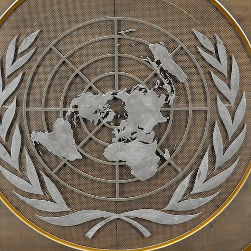 FILE - The United Nations logo is seen inside the 79th session of the United Nations General Assembly, Tuesday, Sept. 24, 2024. (AP Photo/Pamela Smith, File)