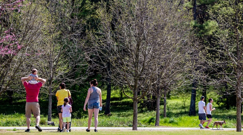Out and about on the Atlanta Beltline near the skatepark on March 27, 2020, people seemed to be keeping appropriate social distance. The Beltline’s CEO said the trails should be used as a “transportation corridor” for people who need to go to work, get groceries, medical supplies and services — not for recreation for the cabin fevered — as the coronavirus continued to upend everyday life. (Jenni Girtman for The Atlanta Journal-Constitution)