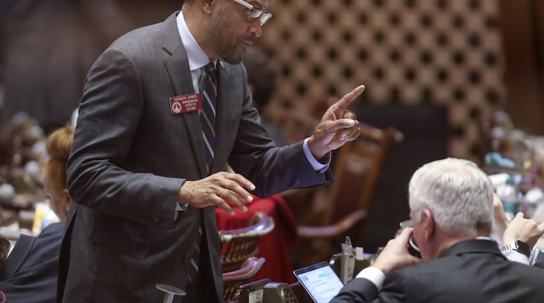 February 20, 2020 - Atlanta - Rep. Vernon Jones, D - Lithonia, confers with a colleague as the General Assembly returned for the 16th legislative day. Bob Andres / robert.andres@ajc.com