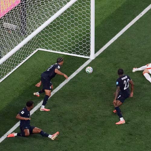 Turkey's Kaan Ayhan, second from right, scores their third goal as United States' Auston Trusty (6) defends and United States' Mark McKenzie (22) and United States' Miles Robinson (12) look on during the second half of a World Cup Group D soccer match in Inglewood, Calif., near Los Angeles, Thursday, June 25, 2026. (AP Photo/Marcio J. Sanchez)