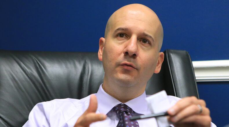 100515 ATLANTA: Braves general manager John Coppolella answers questions during an end of season interview with the media in the team clubhouse on Monday, Oct. 5, 2015, in Atlanta. Curtis Compton / ccompton@ajc.com