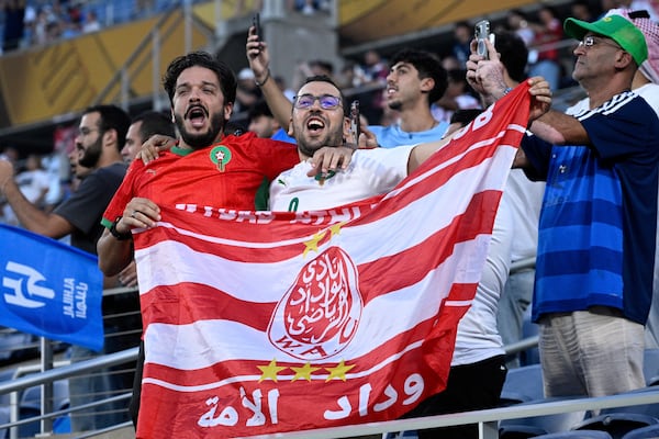 Fans cheer before the Club World Cup round of 16 soccer match between Manchester City and Al Hilal in Orlando, Fla., Monday, June 30, 2025. (AP Photo/Phelan Ebenhack)