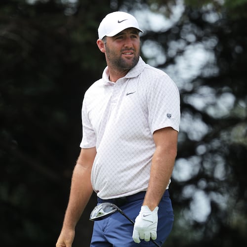 Scottie Scheffler reacts to his shot from the second tee during the final round of the 3M Open golf tournament at the Tournament Players Club Sunday, July 26, 2026, in Blaine, Minn. (AP Photo/Bailey Hillesheim)