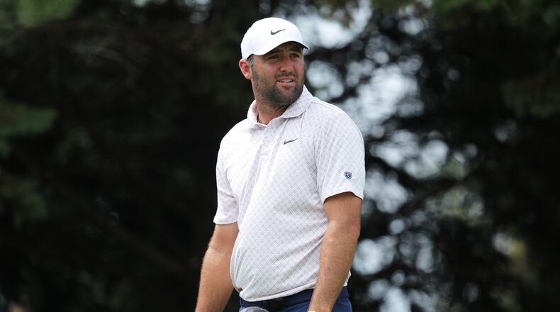 Scottie Scheffler reacts to his shot from the second tee during the final round of the 3M Open golf tournament at the Tournament Players Club Sunday, July 26, 2026, in Blaine, Minn. (AP Photo/Bailey Hillesheim)