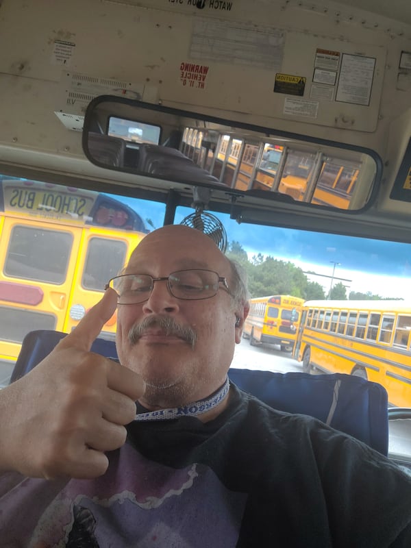 Murl Harmon drives a bus for Cobb County Schools. He pivoted this direction after COVID-19 made magician work hard to find. (Contributed by Cobb County Schools)