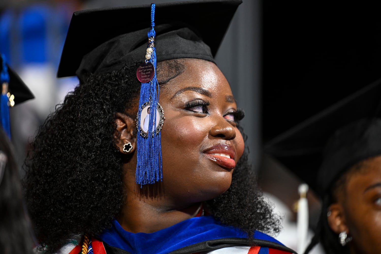 A graduating student looks for family members during Clark Atlanta University’s 2025 commencement ceremony Sunday, May 18, 2025 at Georgia State’s Convocation Center. (Daniel Varnado/For the Atlanta Journal-Constitution)