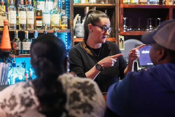 Bartender Molly Tolar takes an order at Agave on Friday, Jan. 23, 2026, in Atlanta. With Agave’s closure looming, chef and owner Jack Sobel remains focused on helping others, specifically the restaurant’s employees. (Abbey Cutrer/AJC)