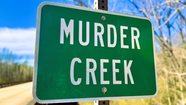 The lone known surviving Murder Creek road sign along a state highway. This one is posted along Ga. 16 between Eatonton and Monticello, about 18 miles south of I-20. (Joe Kovac Jr./AJC)