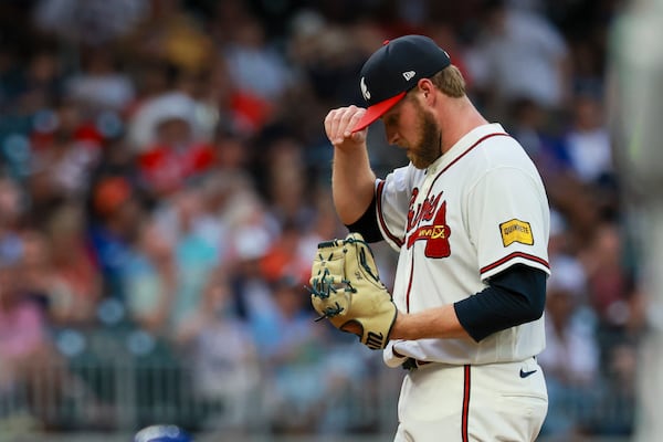 Atlanta Braves starting pitcher Bryce Elder reacts after giving up a hit to a New York Mets player during the second inning at Truist Park, Monday, Aug. 10, 2026, in Atlanta. The Braves lost 8-5. (Jason Getz/AJC)