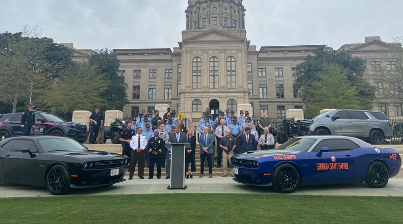 Gov. Brian Kemp (center) praised the work of the state's multi-agency Crime Suppression Unit in through its first year of operation.