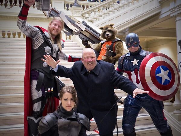 Craig Miller, center, poses with Marvel superheroes at the Georgia State Capitol. (Courtesy of Craig Miller)