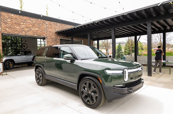 250404 Alpharetta, GA — A Rivian R1S is parked in the courtyard of the new Rivian “space” at Avalon in Alpharetta on Friday, April 4, 2025. (Bita Honarvar for The Atlanta Journal-Constitution)