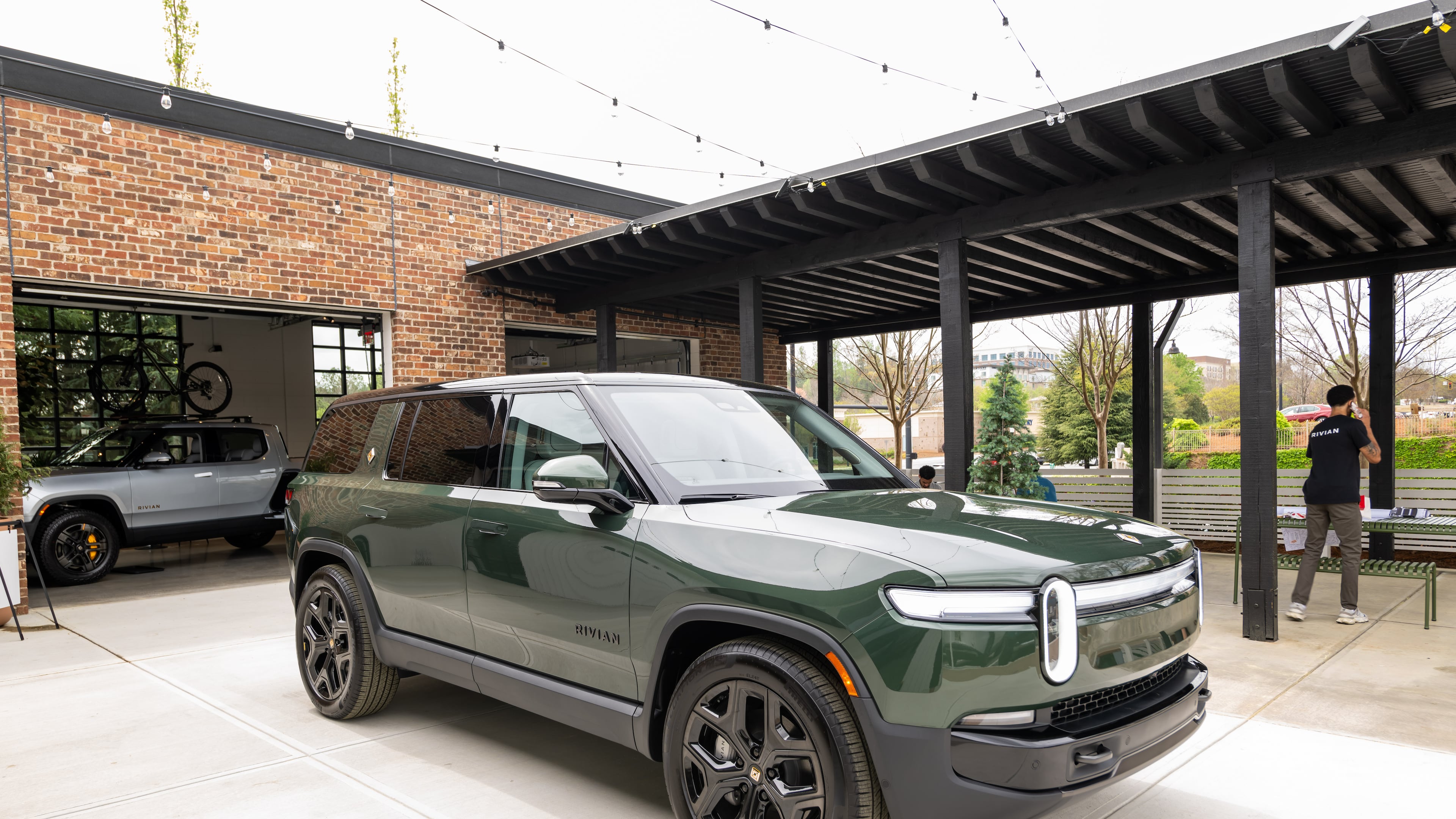 250404 Alpharetta, GA — A Rivian R1S is parked in the courtyard of the new Rivian “space” at Avalon in Alpharetta on Friday, April 4, 2025.
(Bita Honarvar for The Atlanta Journal-Constitution)