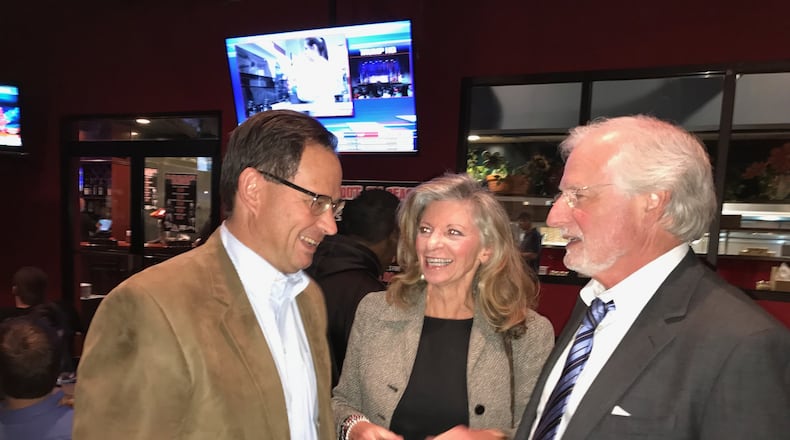 Allen Buckley, Libertarian candidate for the U.S. Senate, talks with Eileen and Clay Scofield during an election night gathering at the Mellow Mushroom pizza restaurant south of Buckhead. Libertarians made some gains Tuesday, but Buckley failed to earn a hoped-for double-digit percentage in a three way race against Republican Johnny Isakson and Democrat Jim Barksdale. Photo: Bo Emerson