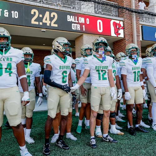 Buford readies to take the field before the first half of a high school football game between Buford and Gainesville, Saturday, Aug. 22, 2026, in Buford, GA. (Erik S. Lesser for the AJC)