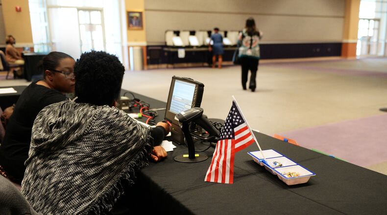 MARCH 21, 2017 STONECREST Pollworkers watch as voters select a Mayor and City Council March 21, 2017, at the New Birth Missionary Baptist Church polling location during Tuesday's election. New cities in southern DeKalb County as well as South Fulton selected their choices of leadership Tuesday. KENT D. JOHNSON/AJC