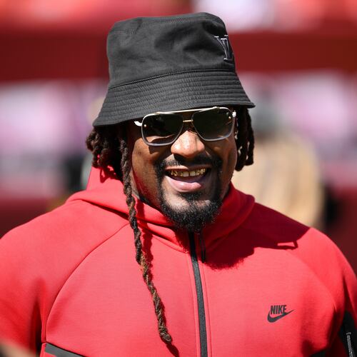 FILE - Marshawn Lynch looks on before an NFL preseason football game between the Washington Commanders and the Baltimore Ravens, Aug. 23, 2025, in Landover, Md. (AP Photo/Nick Wass, File)
