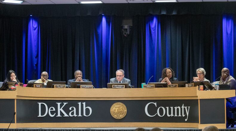 Members of the DeKalb County Board of Commissioners listen as citizens speak during a meeting on March 13, 2018. ALYSSA POINTER/ALYSSA.POINTER@AJC.COM