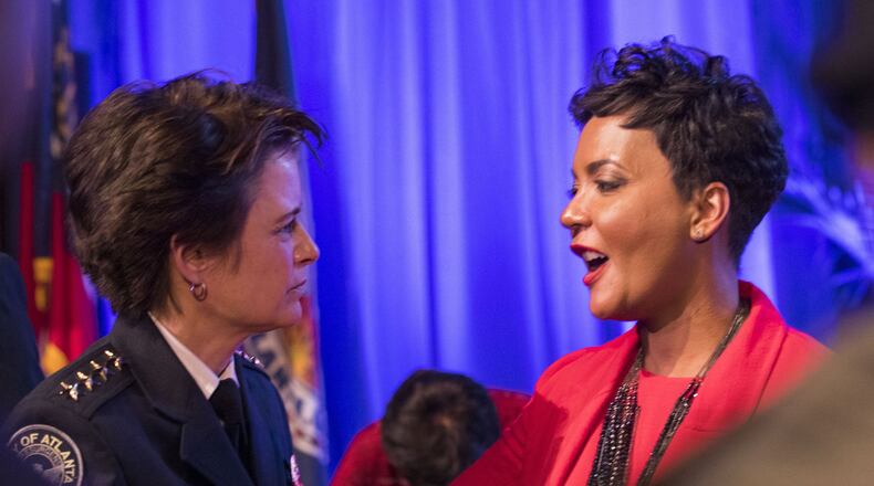 Atlanta Mayor Keisha Lance-Bottoms (right) talks with Atlanta Police Chief Erika Shields at the Martin Luther King Jr. International Chapel at Morehouse College in Atlanta on January 2, 2018. ALYSSA POINTER / AJC