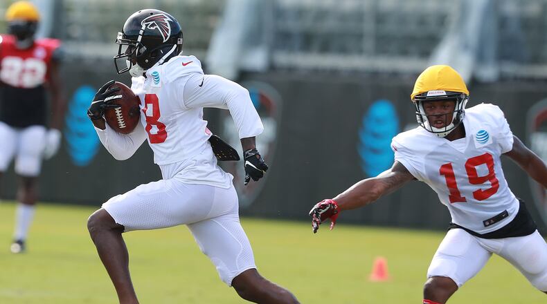 August 7, 2018 Flowery Branch: Atlanta Falcons wide reciever Calvin Ridley returns a punt during NFL football training camp practice on Tuesday, August 7, 2018, in Flowery Branch. Curtis Compton/ccompton@ajc.com