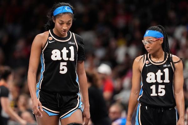 The Dream's Angel Reese (left) and Allisha Gray, during the second half of Sunday's overtime loss to the Fever. (Brynn Anderson/AP)