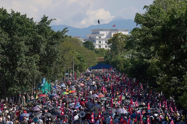 Pro-monarchy supporters take part in a rally calling for the restoration of Nepal's monarchy in Kathmandu, Nepal, Thursday, May 29, 2025. (AP Photo/Niranjan Shrestha)