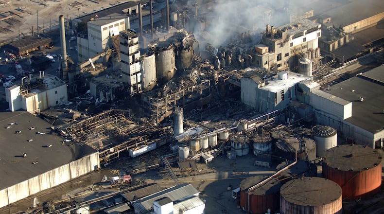 Firefighters fight a blaze Feb. 8, 2008, at the Imperial Sugar Company after an explosion Thursday night ripped apart the plant on the Savannah River in Port Wentworth, Ga. The blast killed 14 people and injured dozens more. (AP Photo/Stephen Morton)