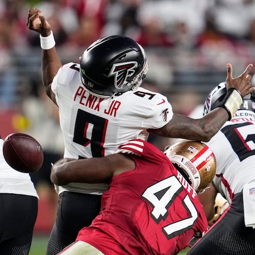 San Francisco 49ers defensive end Bryce Huff (47) forces a fumble against Atlanta Falcons quarterback Michael Penix Jr. (9) in the first half of an NFL football game, Sunday, Oct. 19, 2025, in Santa Clara, Calif. (Godofredo A. Vásquez/AP)