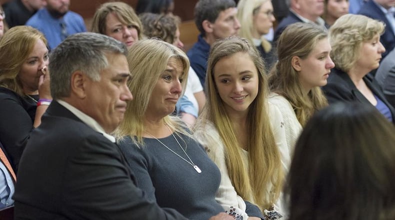 The family of Natalie Henderson reacts to the judge’s decision at the conclusion of the sentencing of Jeffrey Hazelwood on Wednesday(DAVID BARNES / DAVID.BARNES@AJC.COM)