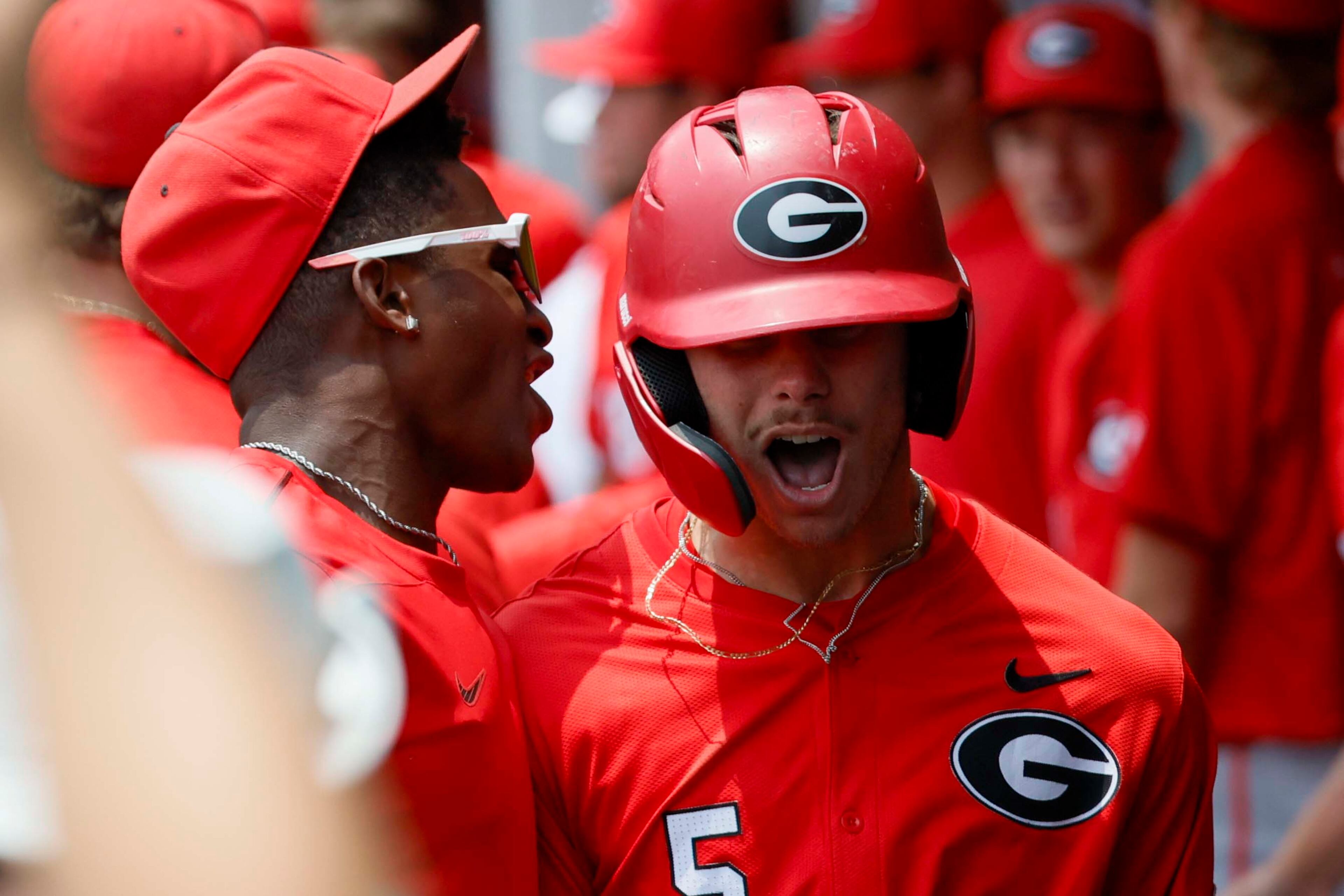Georgia infielder Christian Adams (5), right, celebrates celebrates with teammates after hitting a two-run home run during the second inning against Oklahoma State in their NCAA Regional game at Foley Field,  Sunday, June 1, 2025, in Athens, Ga.
(Miguel Martinez/ AJC)