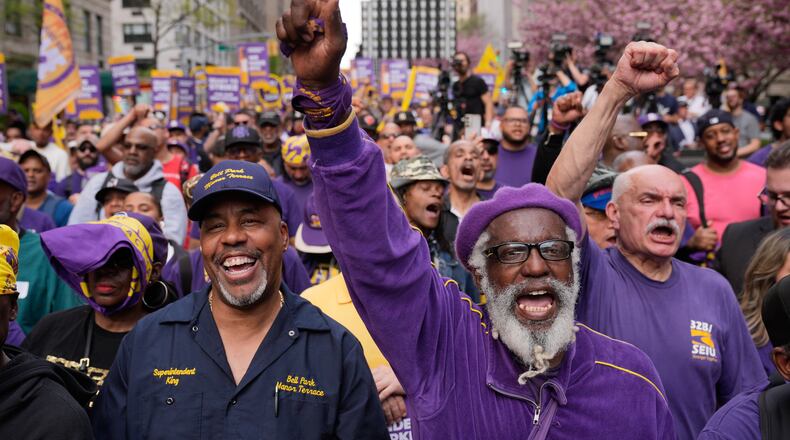 Members of the 32BJ SEIU union and their supporters rally on Park Avenue, in New York, Wednesday, April 15, 2026. (AP Photo/Seth Wenig)