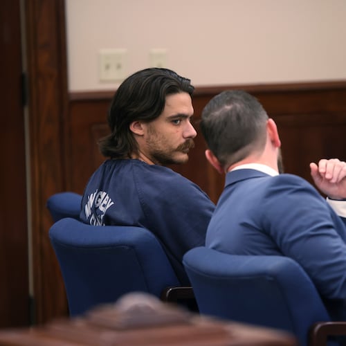 Dalton Eatherly, who goes by the moniker Chud the Builder, speaks with attorney Jacob Fendley during a hearing at the Montgomery County Courthouse, Thursday, May 21, 2026, in Clarksville, Tenn. (AP Photo/Adin Parks)