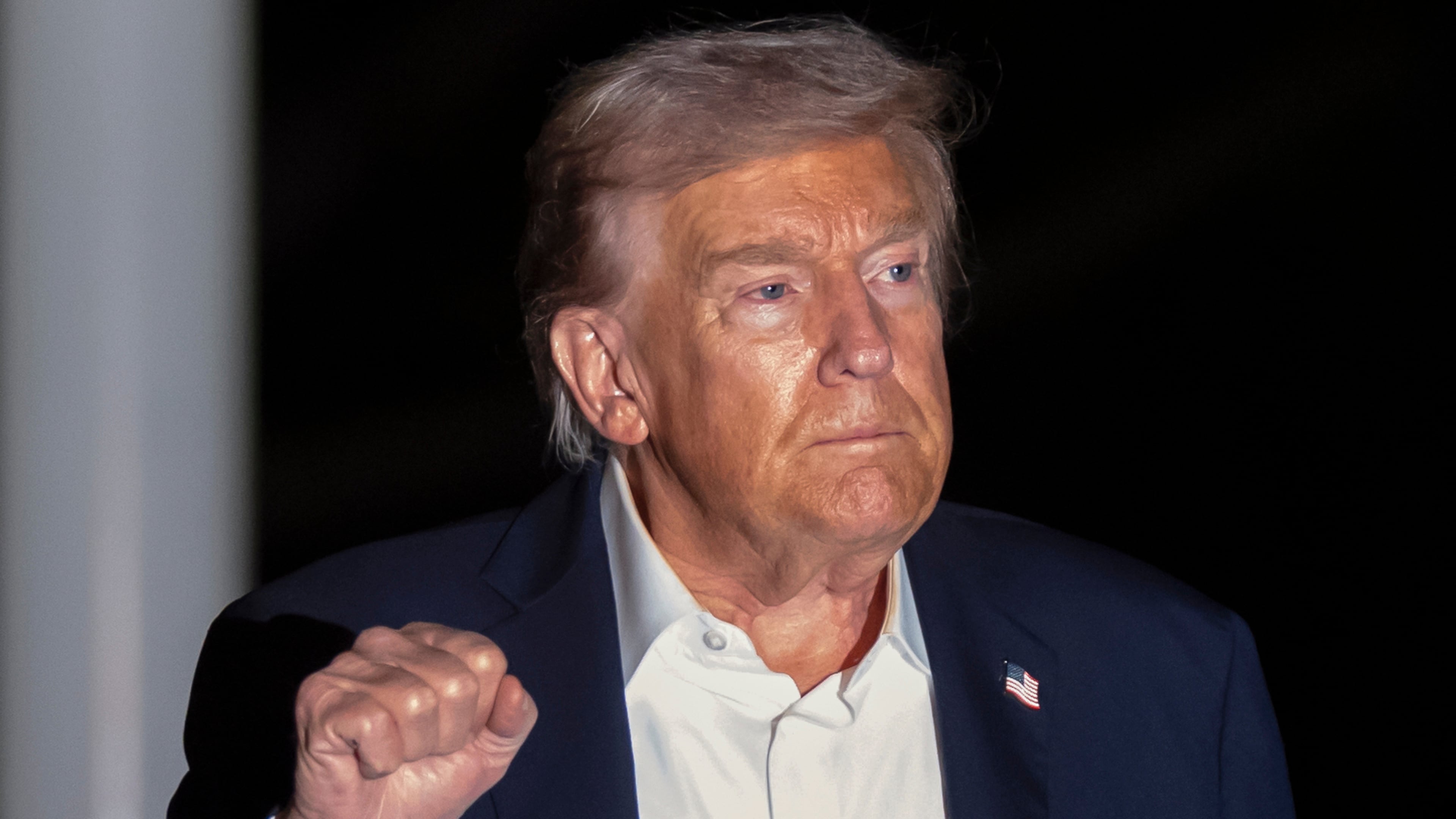 President Donald Trump walks across the South Lawn of the White House, early Tuesday, Oct. 14, 2025, in Washington, after returning from a trip to Israel and Egypt. (AP Photo/Mark Schiefelbein)