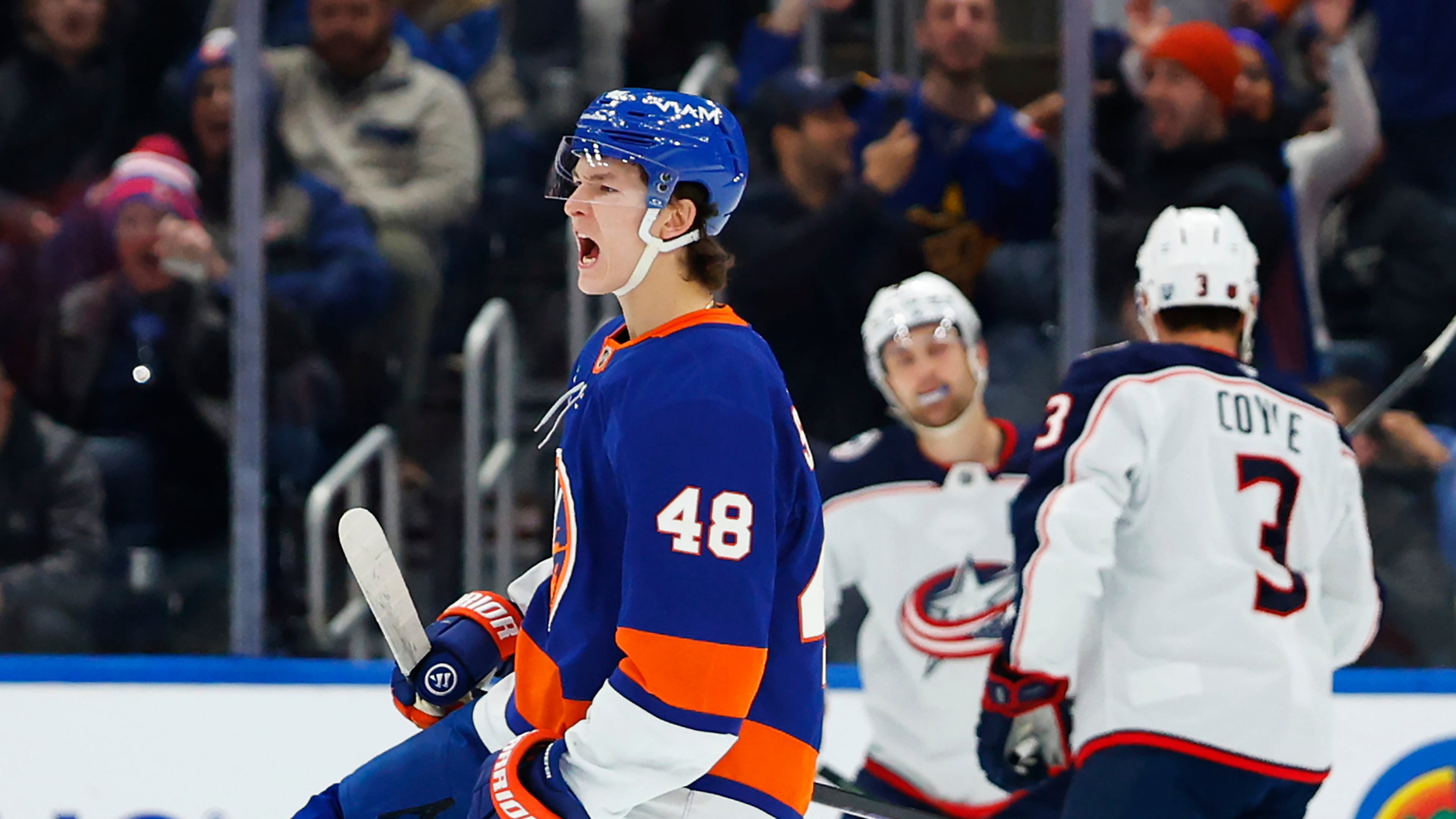 New York Islanders defenseman Matthew Schaefer (48) reacts after scoring against the Columbus Blue Jackets during the first period of an NHL hockey game, Sunday, Nov. 2, 2025, in New York. (AP Photo/Noah K. Murray)