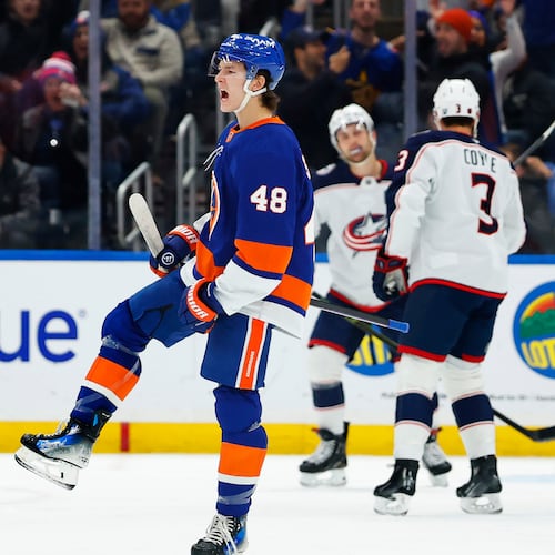New York Islanders defenseman Matthew Schaefer (48) reacts after scoring against the Columbus Blue Jackets during the first period of an NHL hockey game, Sunday, Nov. 2, 2025, in New York. (AP Photo/Noah K. Murray)