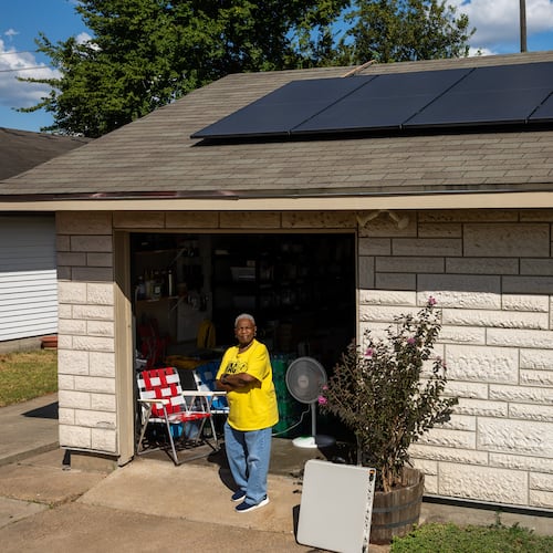 Doris Brown, Hub home captain, poses for a portrait under her solar panels on Wednesday, Oct. 8, 2025, in Houston. (AP Photo/Antranik Tavitian)