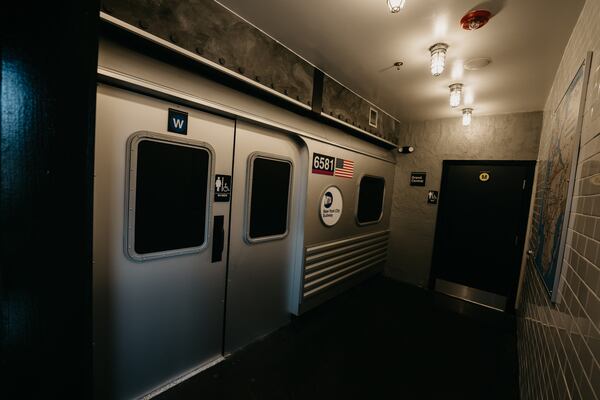 The bathroom at Two Cities is designed to look like a New York City subway platform.