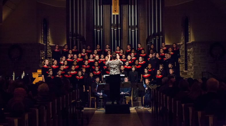 Paige Mathis conducts Atlanta Young Singers. She has served as music director of the organization for almost 20 years. KRISTIN BOYER