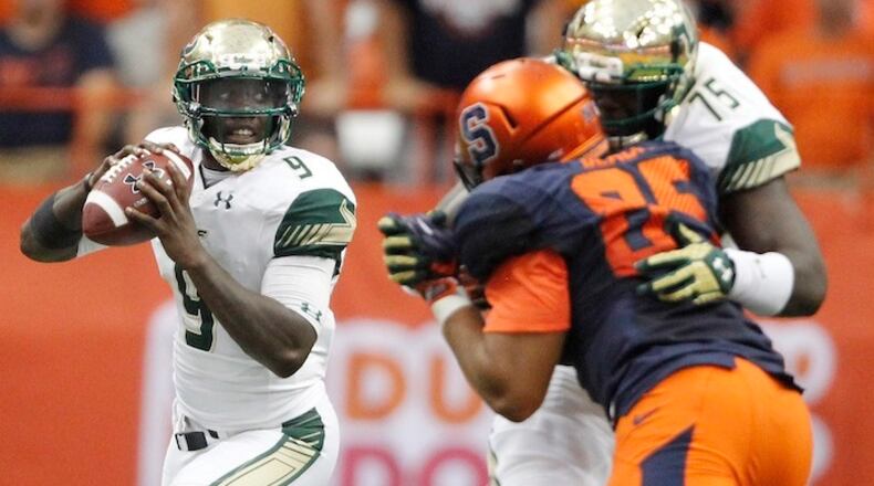 South Florida's Quinton Flowers looks to pass the ball in the second half of an NCAA college football game against Syracuse in Syracuse, N.Y., Saturday, Sept. 17, 2016. South Florida won 45-20. (AP Photo/Nick Lisi)