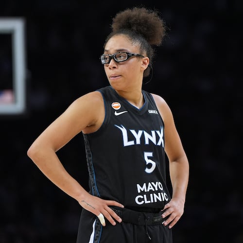 Minnesota Lynx guard Olivia Miles stands on the court during the second half of a WNBA basketball game against the New York Liberty, Friday, Sept. 18, 2026, in Minneapolis. (AP Photo/Abbie Parr)