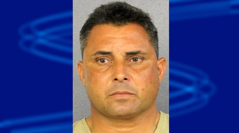 Pablo Batten is accused of showing up at his son's crash scene and slamming the other driver to the pavement.