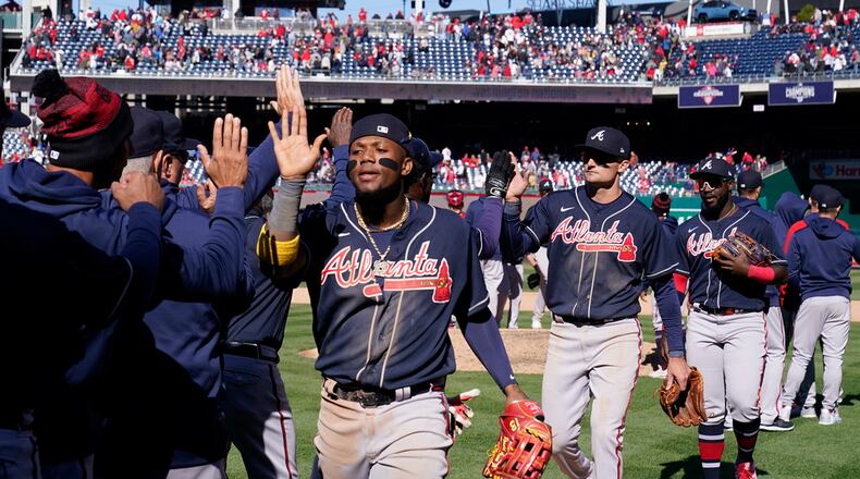 Atlanta Braves right fielder Ronald Acuna Jr. celebrates after an opening day baseball game against the Washington Nationals at Nationals Park, Thursday, March 30, 2023, in Washington. Atlanta won 7-2. (AP Photo/Alex Brandon)