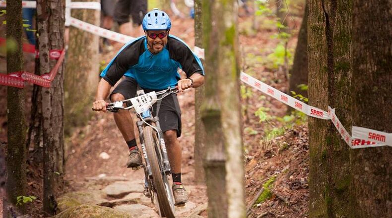 Roswell has awarded a $200,000 contract to Pond & Co. to draw up a bicycle and pedestrian master plan for the city. AJC FILE