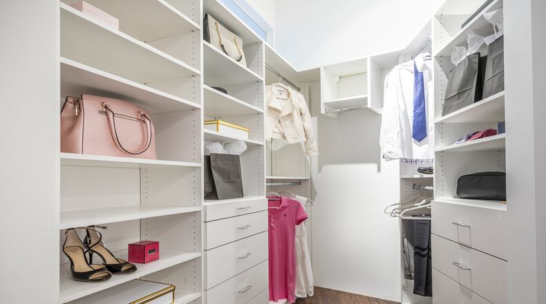 Shelves and drawers help make this closet feel functional and organized. (Design Recipes)