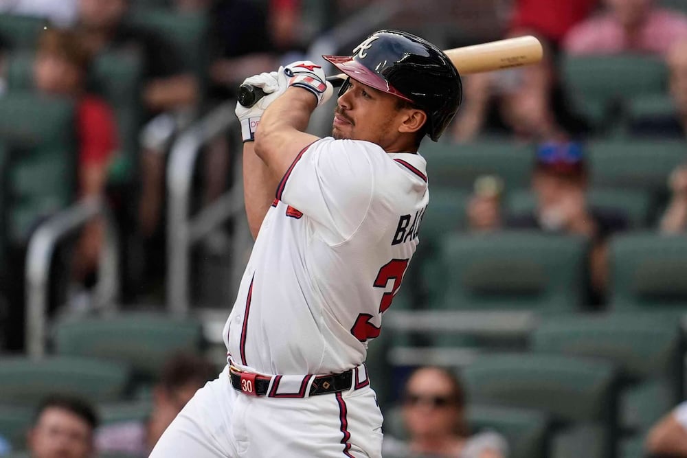 Braves catcher Drake Baldwin in the middle of a bases-clearing double. Ho hum.