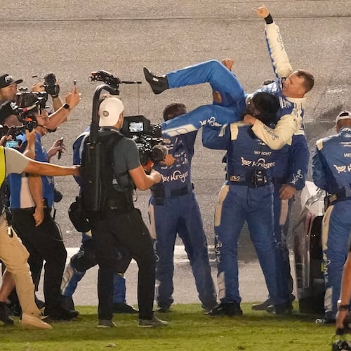 Ryan Preece, center, celebrates with his crew after winning the NASCAR auto race at Daytona International Speedway, Saturday, Aug. 29, 2026, in Daytona Beach, Fla. (AP Photo/John Raoux)